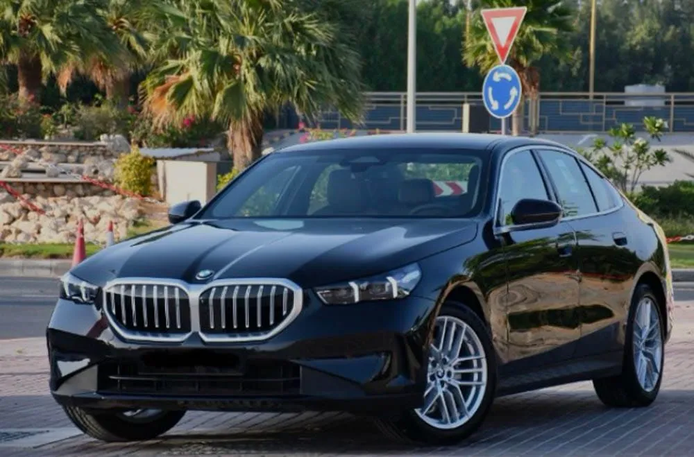 BMW 5 Series With Driver