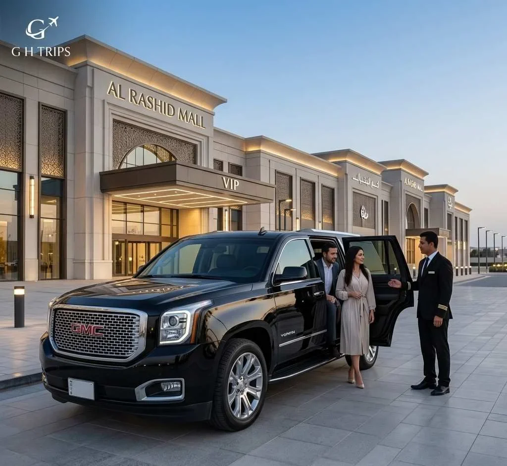 A pristine black GMC Yukon Denali chauffeur vehicle parked at the main entrance of Al Rashid Mall, Al Khobar, Saudi Arabia - ghtrips.com